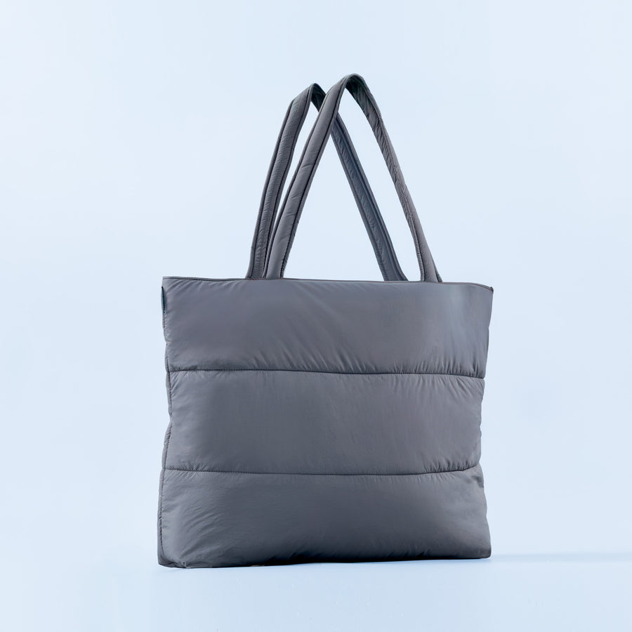 Quilted puffer tote bag with double top handles, dark gray front