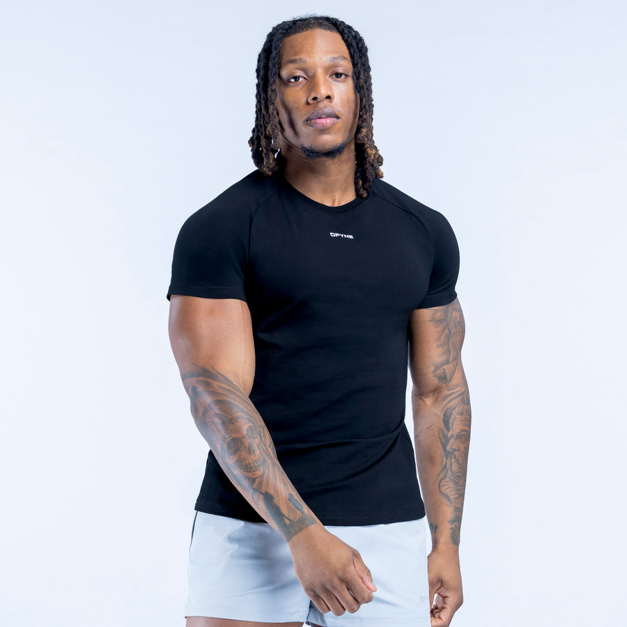 Black T-shirt with small chest logo, crew neck and short sleeves
