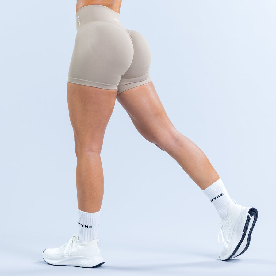 Hannah Pearson 4.5-inch shorts in light taupe, back hem and seam detail