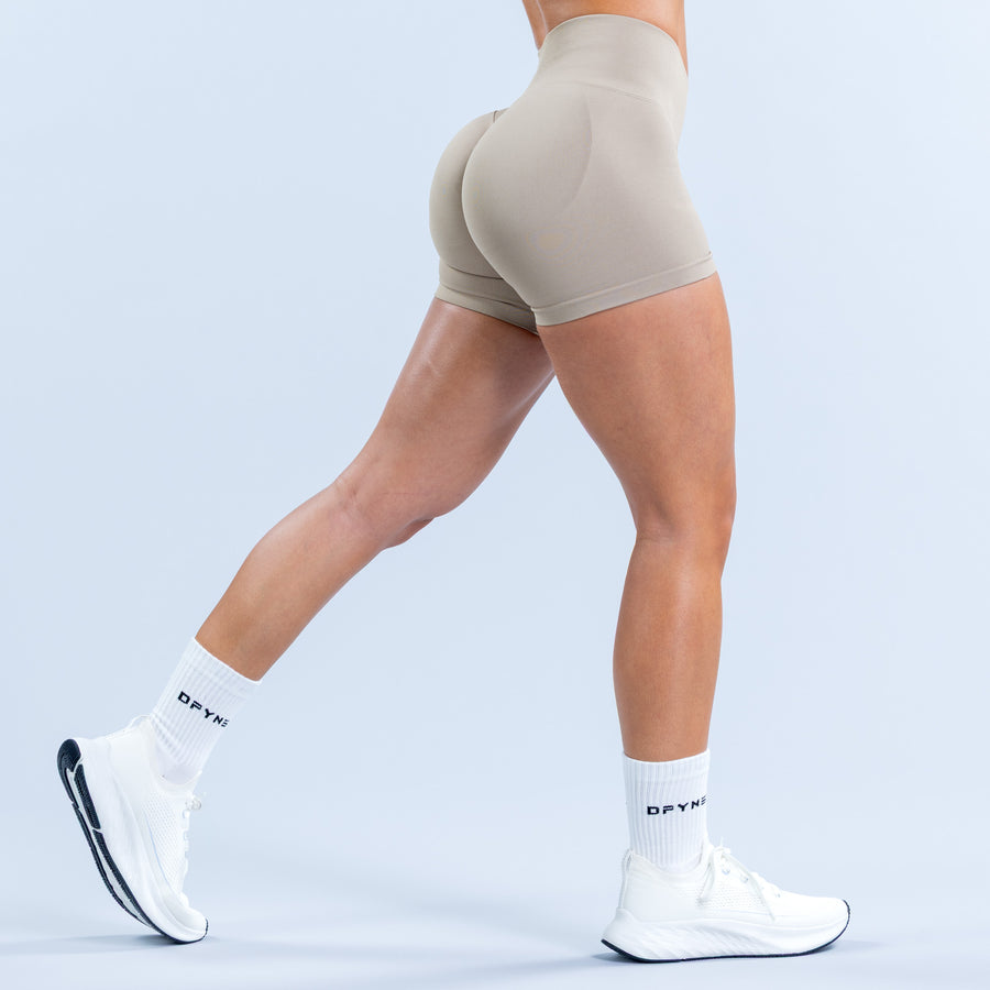 Hannah Pearson 4.5-inch shorts in light taupe, sculpting fit with stretch fabric