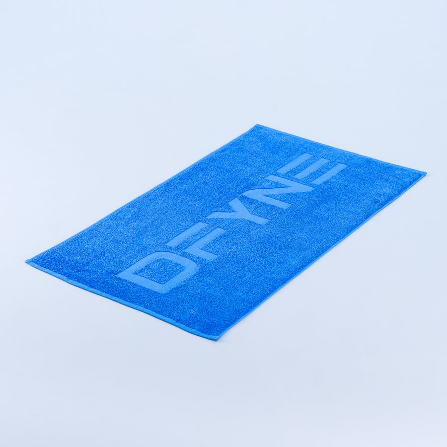 Blue gym towel with printed logo, folded rectangle