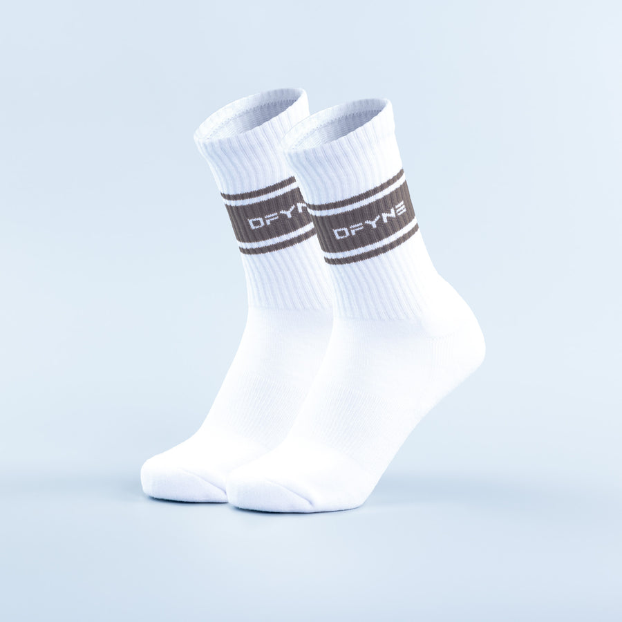 White crew socks with dark stripe bands and printed logo across the cuff