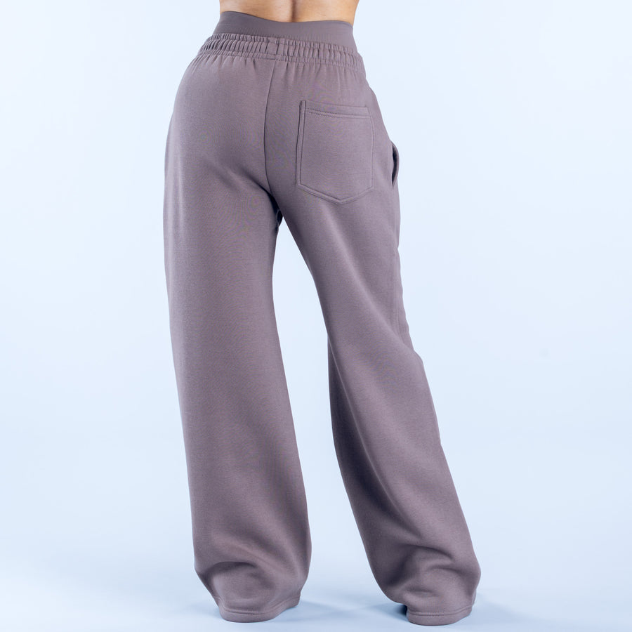 Mauve wide-leg jogger pants with elastic waist and back patch pockets