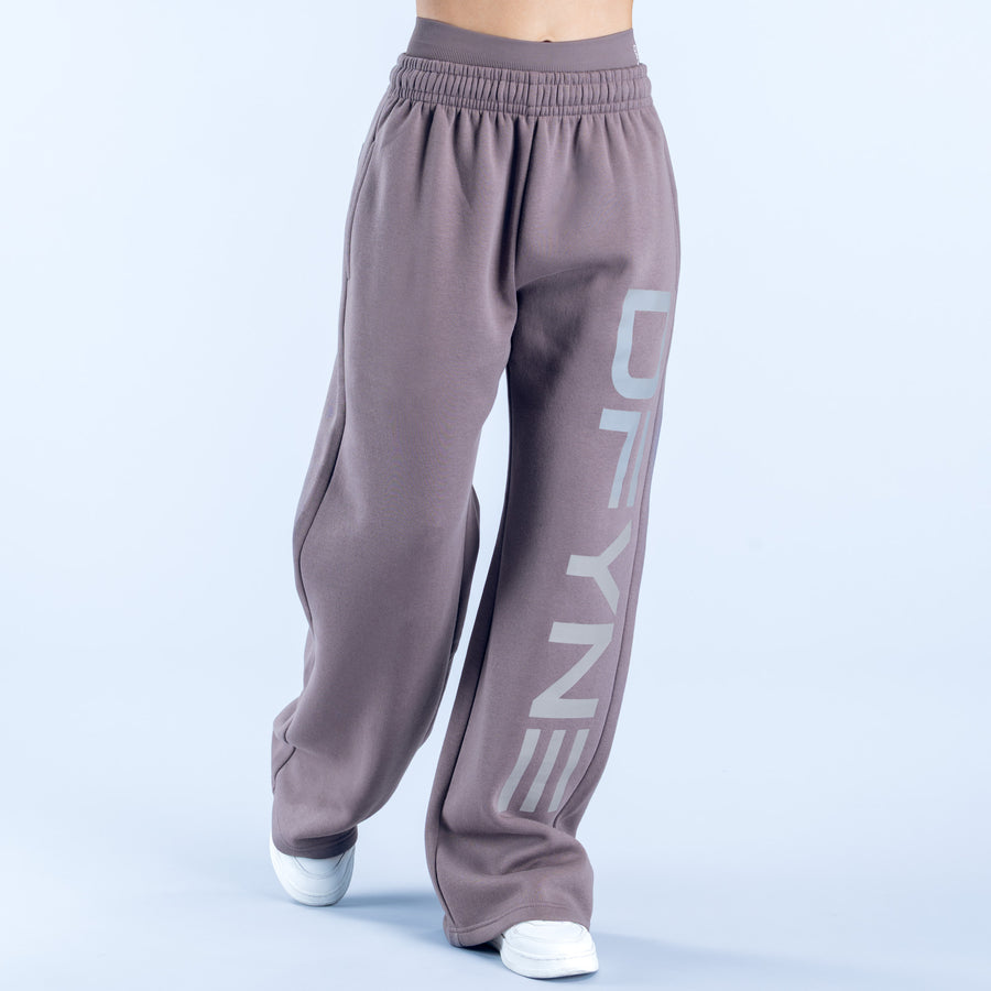Mauve wide-leg jogger pants with elastic waist and vertical logo on thigh