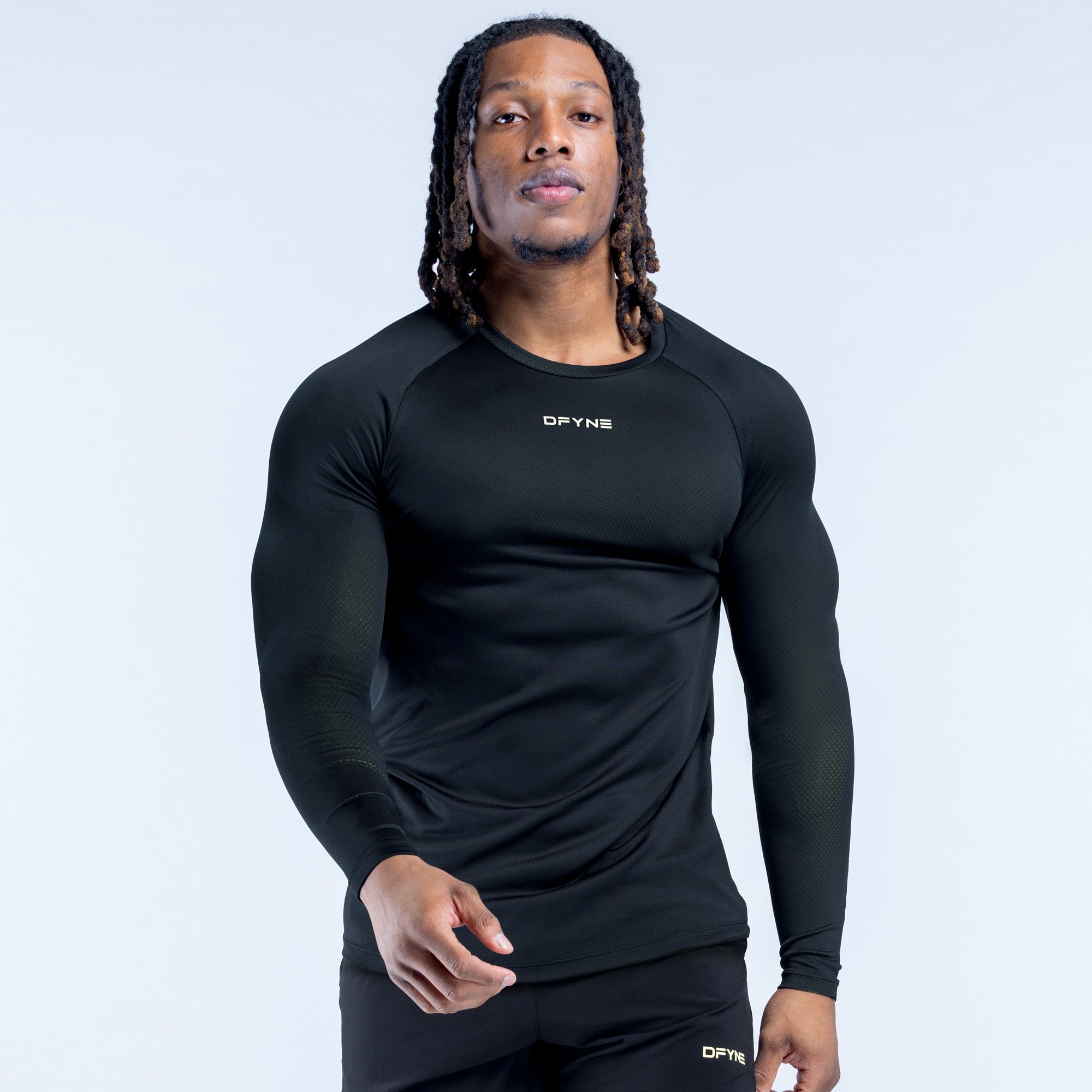 Black long sleeve training T-shirt, crew neck, small chest logo