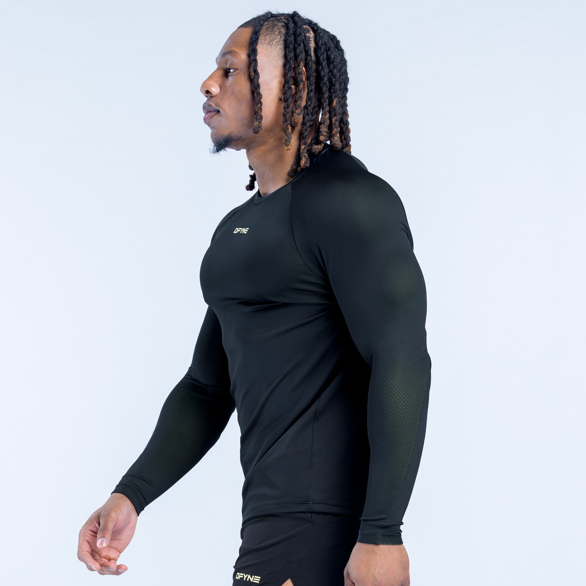 Black long sleeve training T-shirt, side view, crew neck, chest logo
