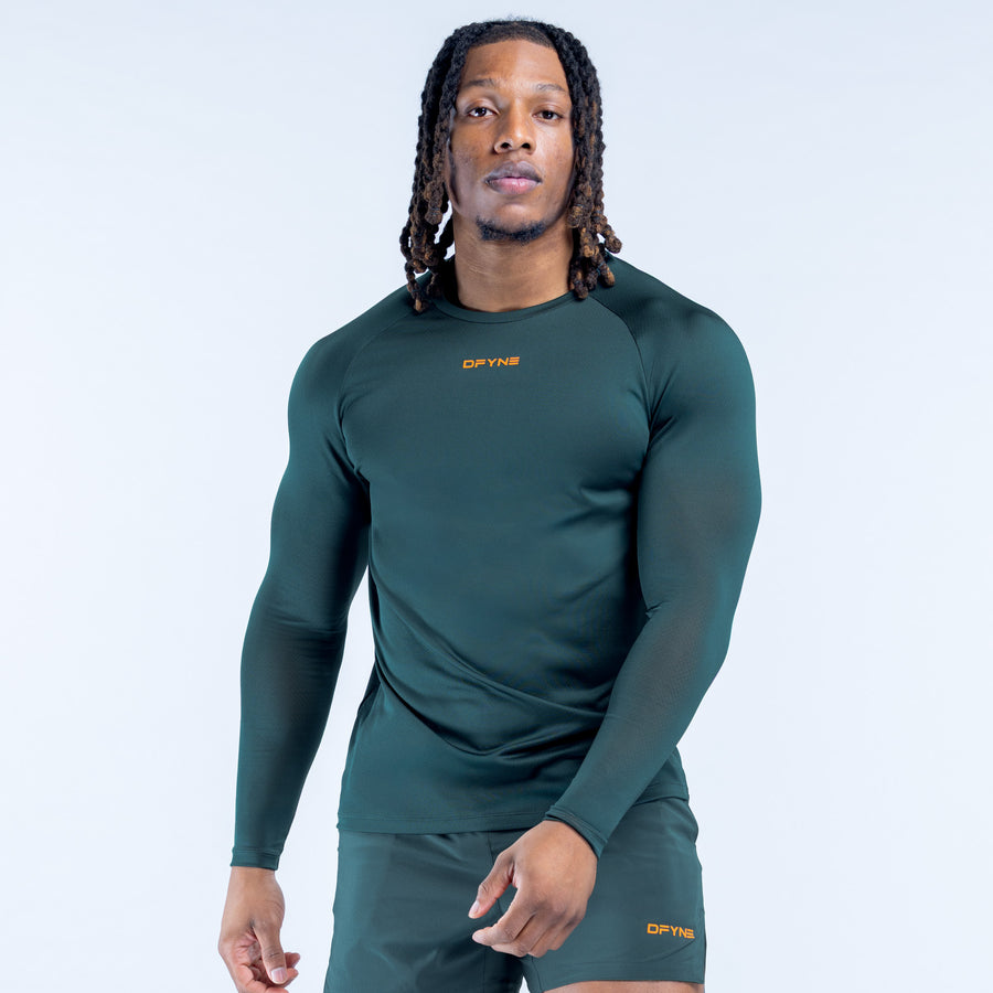 Dark green long-sleeve training T-shirt with crew neck and chest logo