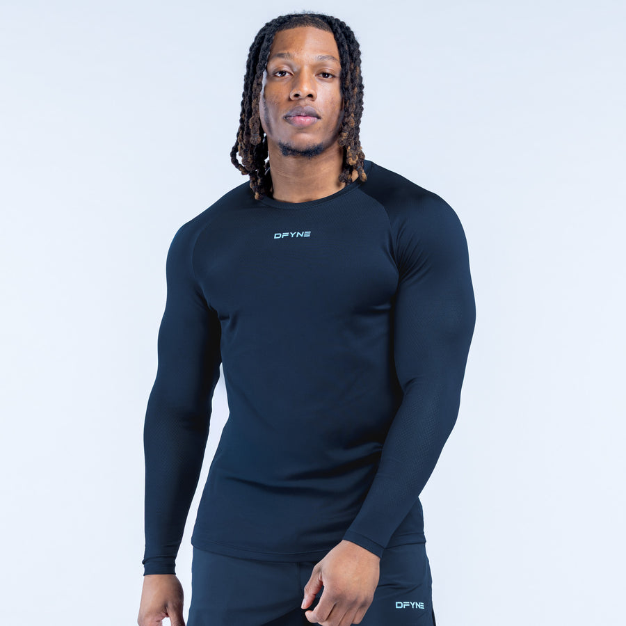 Dark navy long-sleeve training T-shirt with small chest logo, crew neck