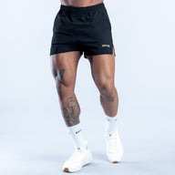 Training shorts with elastic waistband, dark fabric, side logo detail