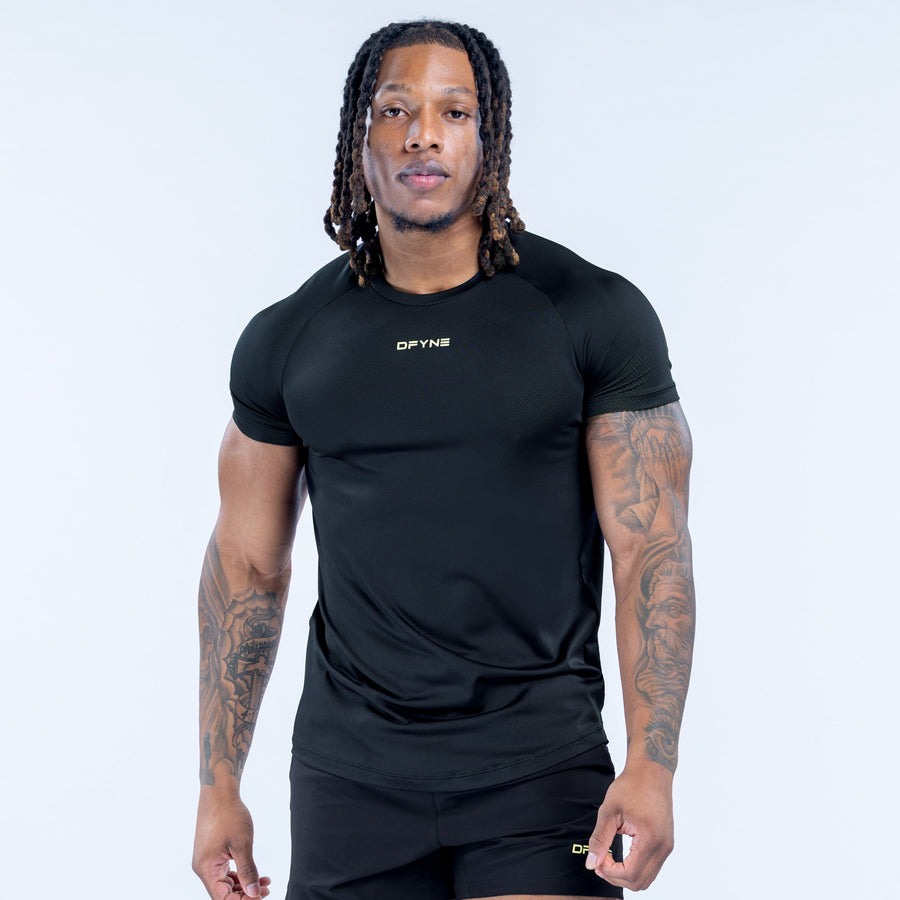 Black training t-shirt with small chest logo, front view, short sleeves and crew neck.