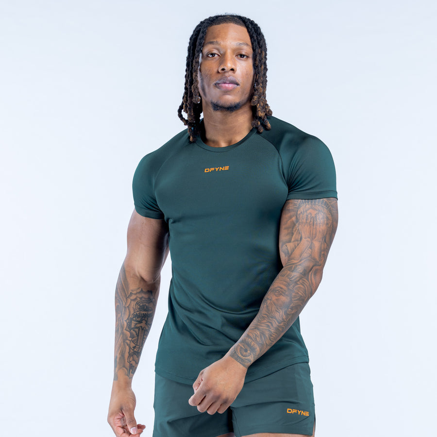 Dark green training T-shirt, crew neck with small chest logo