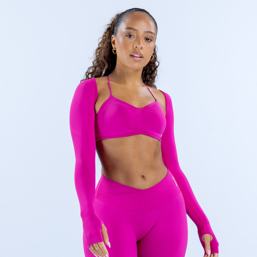 Vision shrug in bright magenta, fitted long-sleeve cover-up with open front