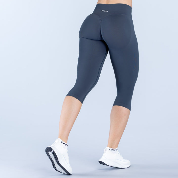 Dark navy capri leggings with straight waistband, back view