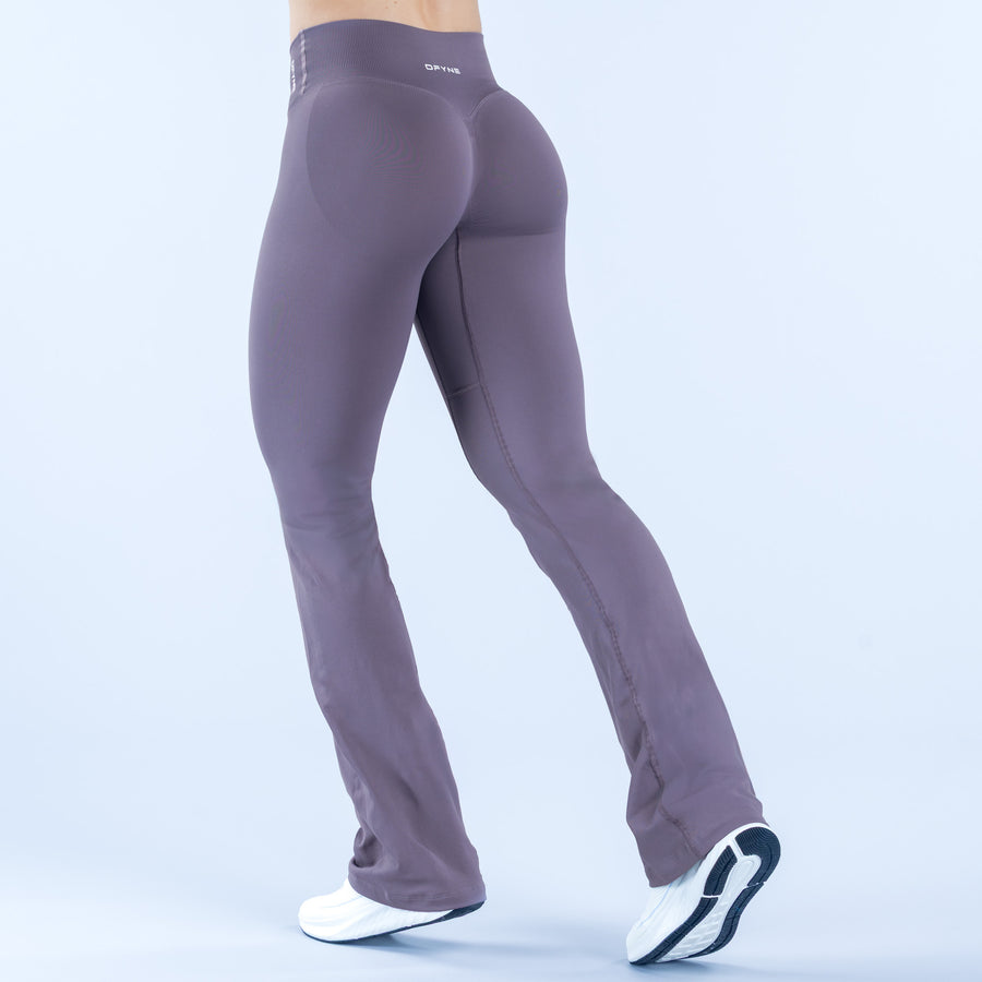 Purple flared leggings with waistband panel and contoured seams