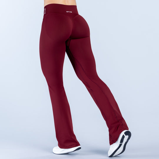 Burgundy flare leggings with straight waistband and smooth front panel
