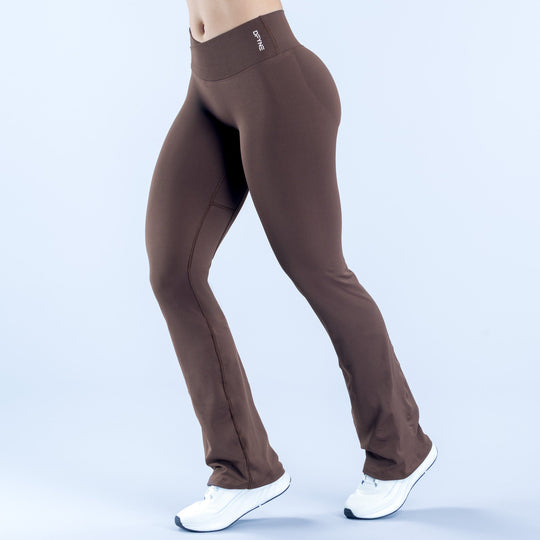 Brown flared leggings, side view, flared at ankles