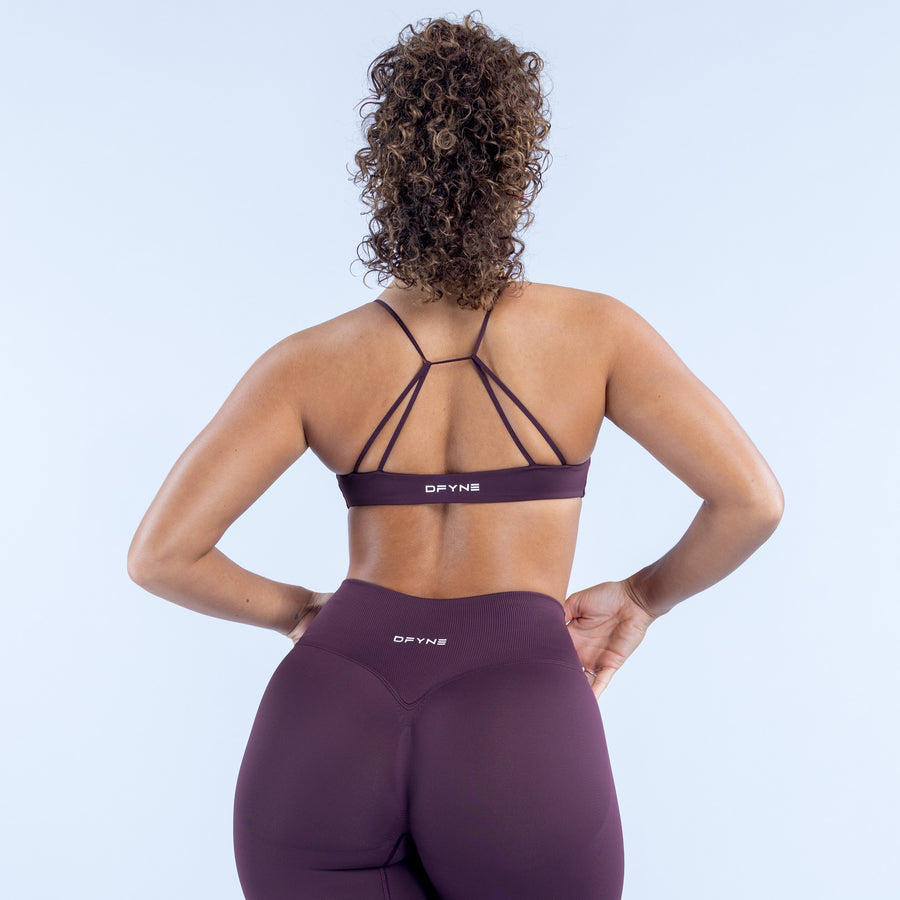 Backless sports bra with crisscross straps, dark plum