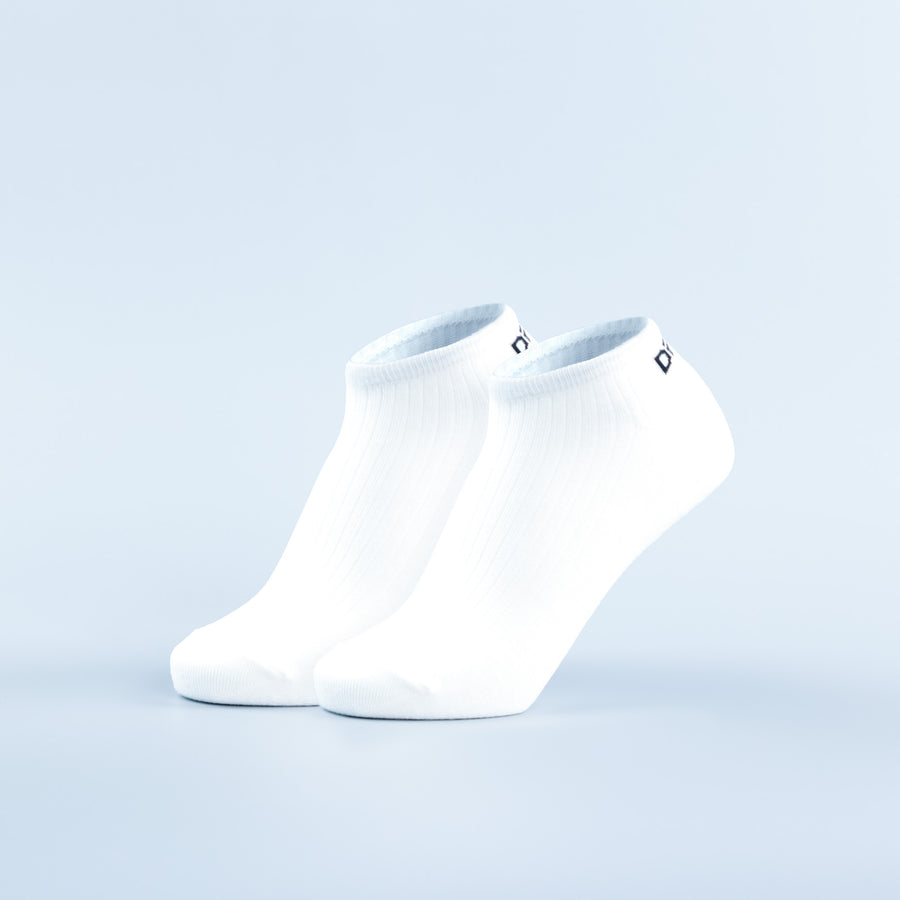 Pair of white ankle socks with dark logo on cuff, lightweight knit
