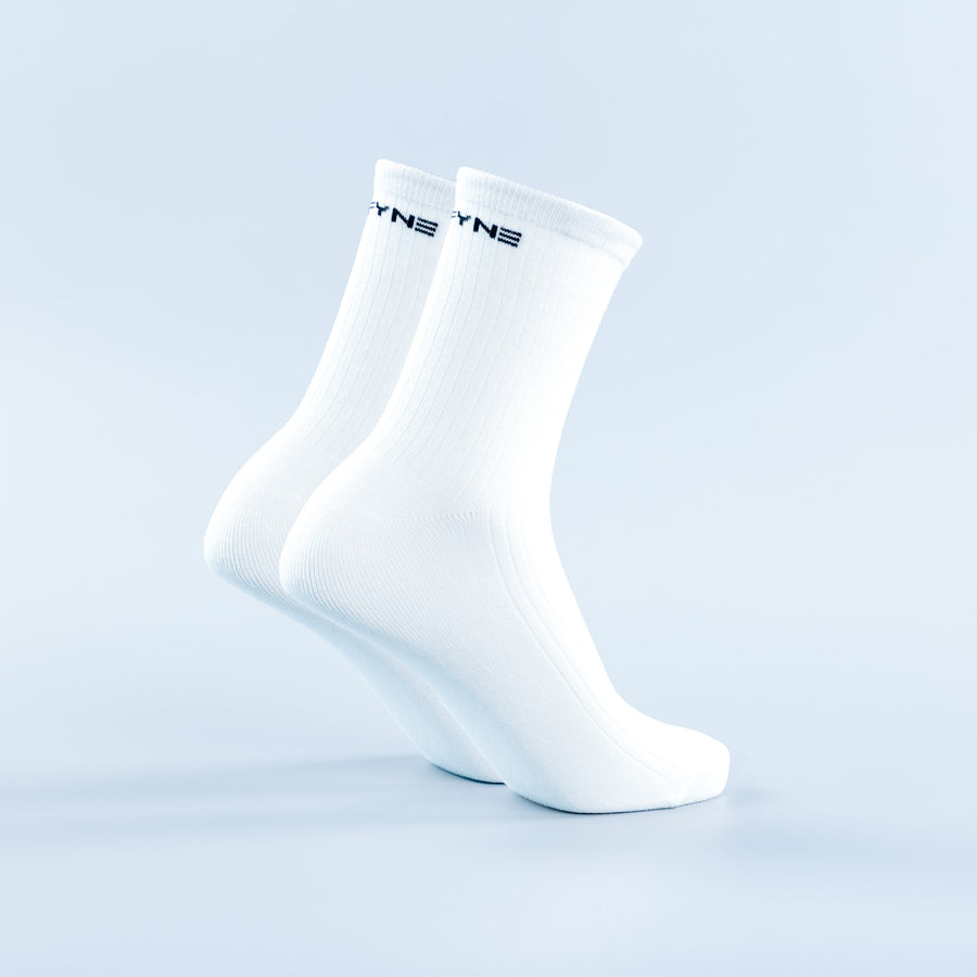 White crew socks with small logo at the cuff and ribbed knit